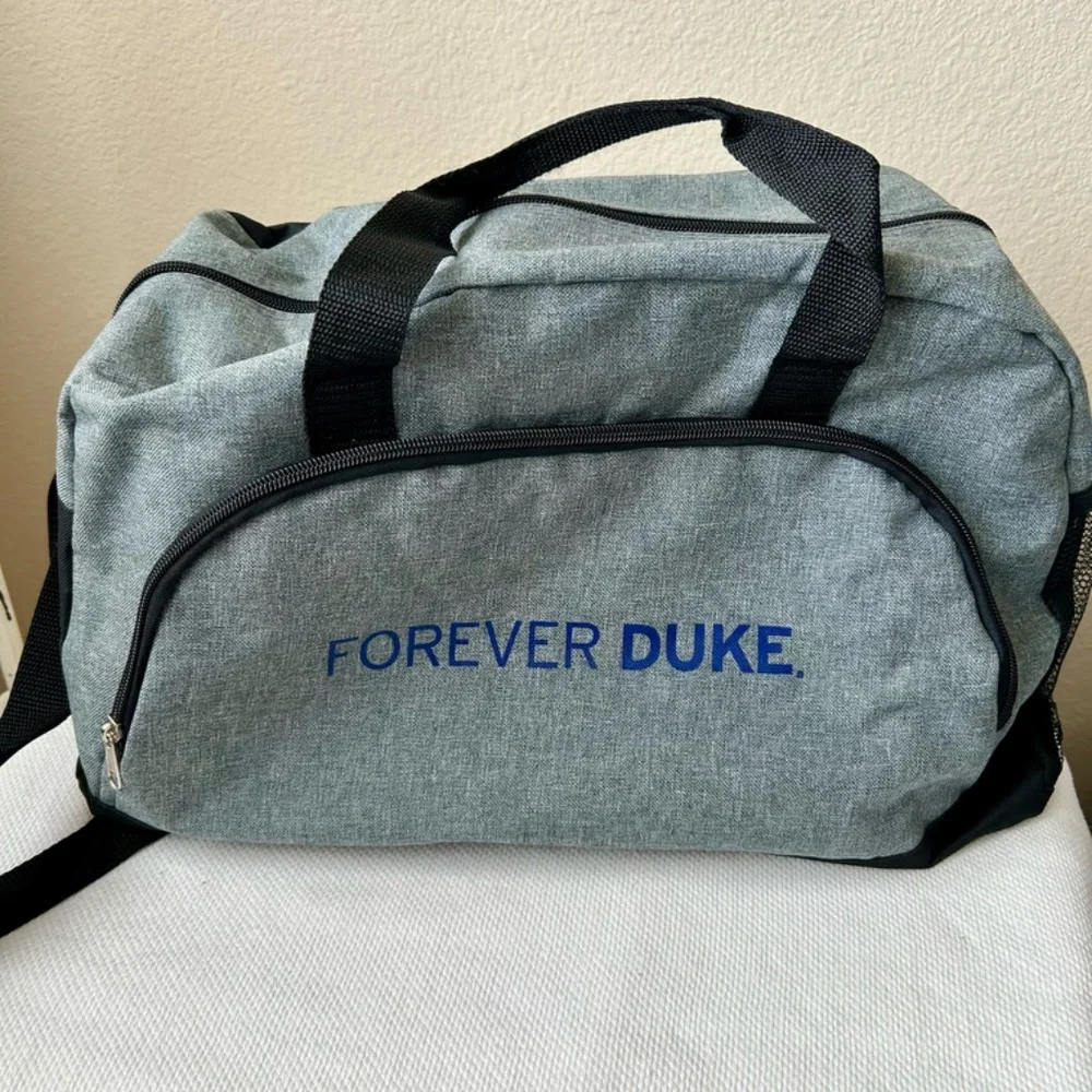 Duke Duffle Bag Gray Black Handles Front zipper pocket side mesh pocket FOREVER
